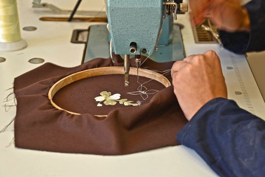 A logo being branded onto a corporate gift